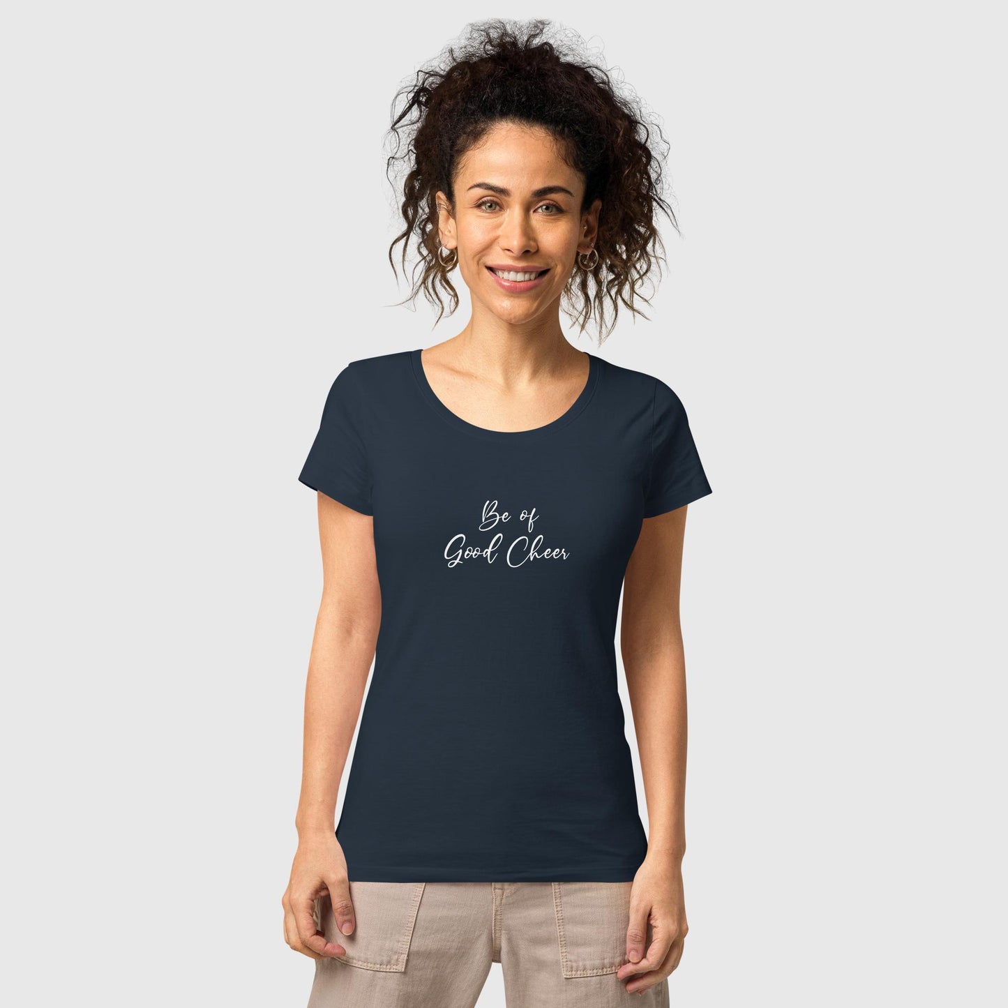 Women's navy organic cotton t-shirt that features the positive quote, "Be of Good Cheer."