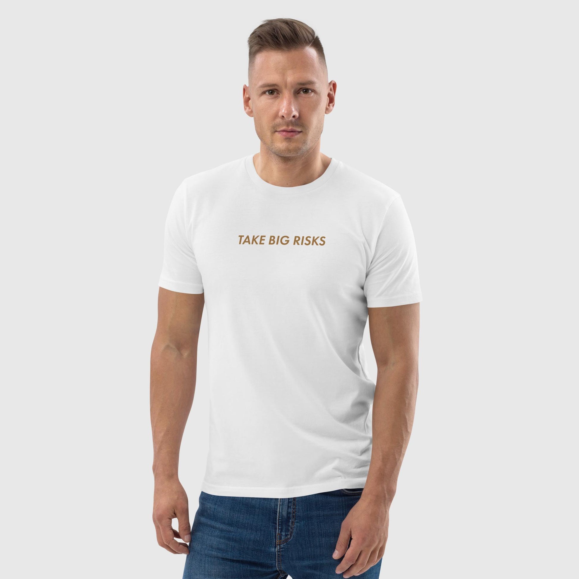 Men's white organic cotton t-shirt that features Bill Gates' quote on success, "Take Big Risks."