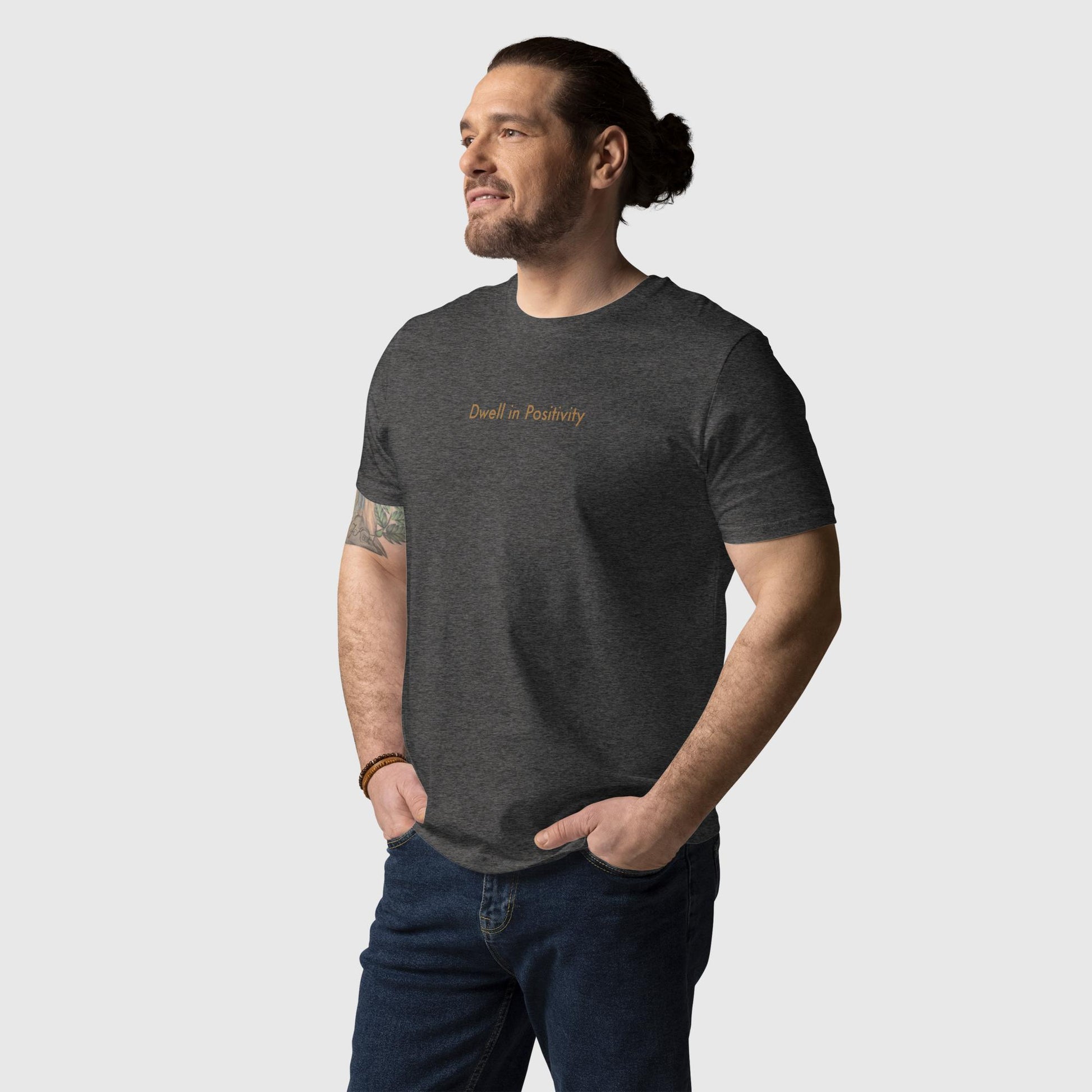 Men's dark heather gray organic cotton t-shirt that features Emily Dickinson's quote, "I dwell in positivity."