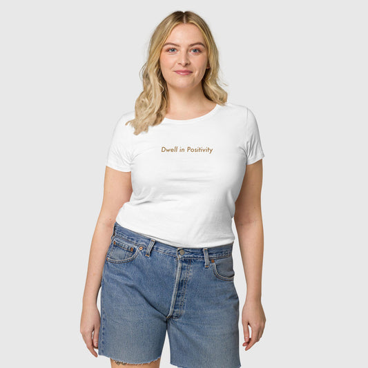 Women's white organic cotton t-shirt that features Emily Dickinson's quote, "I dwell in positivity."