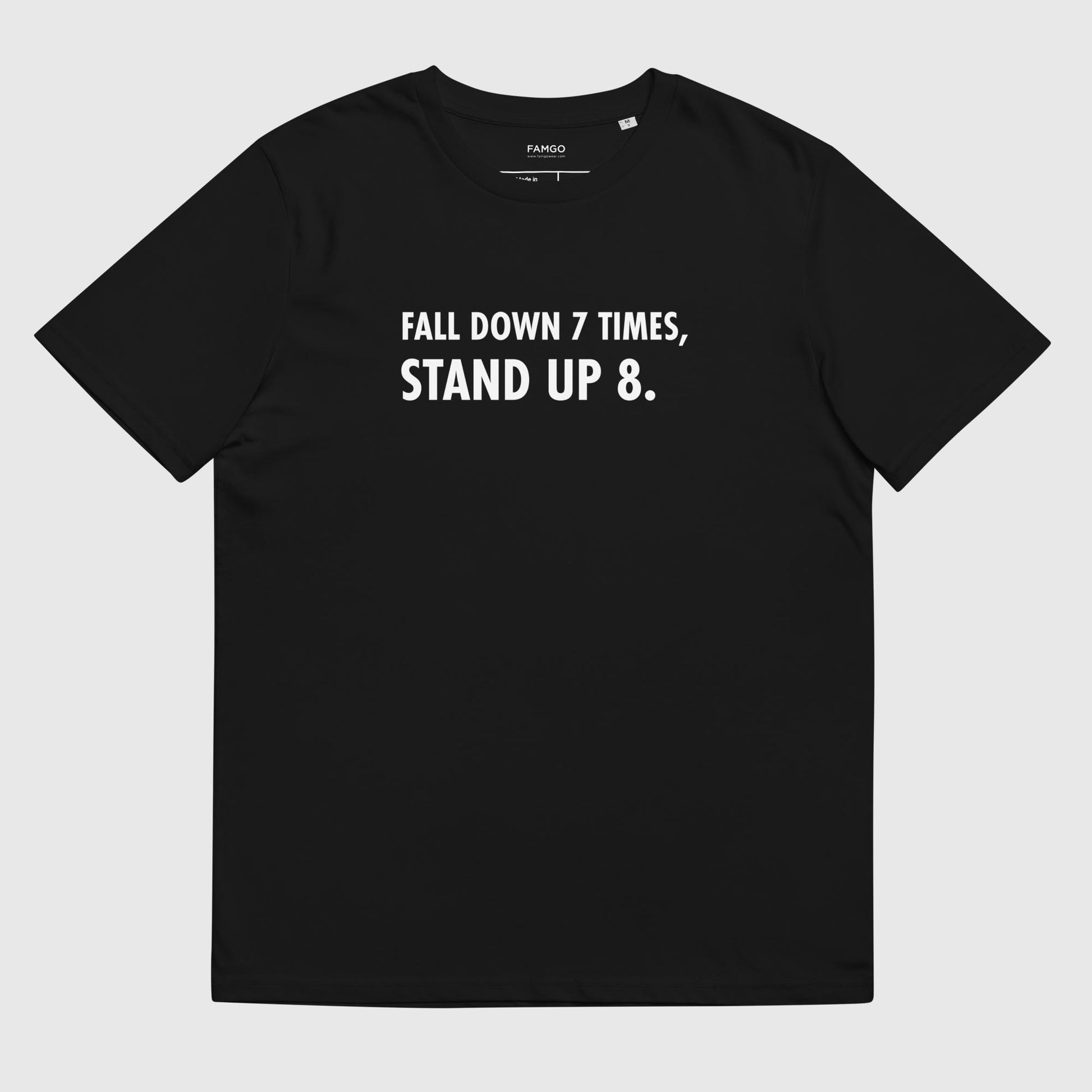 Men's black organic cotton t-shirt that features the Japanese proverb "Fall Down 7 Times, Stand Up 8."