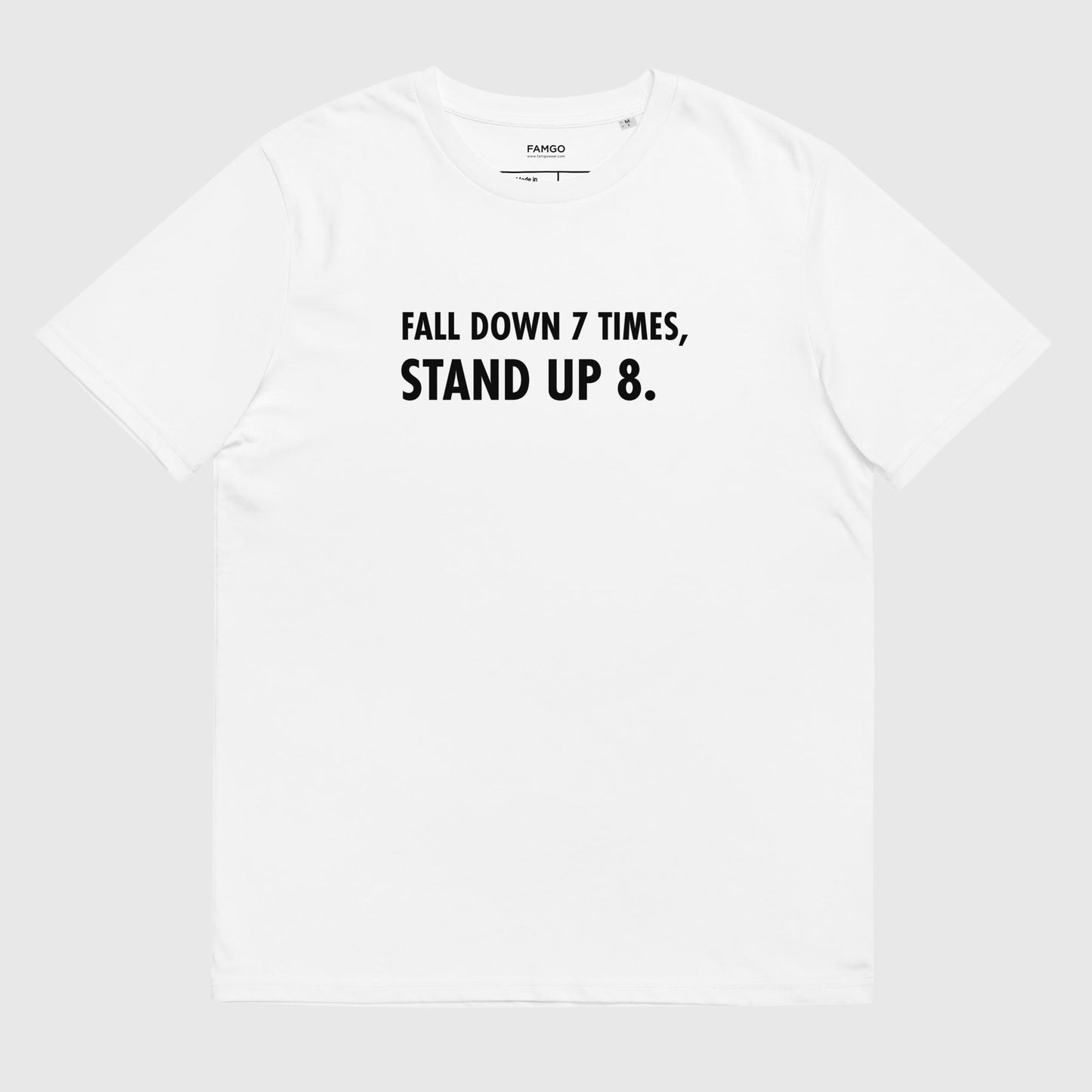 Men's white organic cotton t-shirt that features the Japanese proverb "Fall Down 7 Times, Stand Up 8."