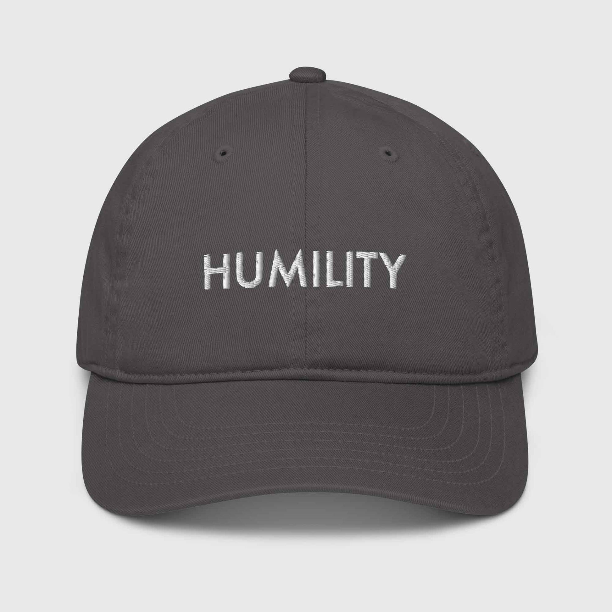 Gray organic cotton baseball cap that says, "Humility"