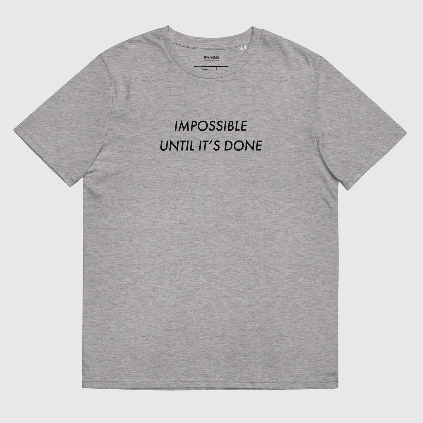 Men's light gray organic cotton t-shirt that features, "Impossible Until It's Done," inspired by Nelson Mandela's inspirational quote, "It always seems impossible until it's done."