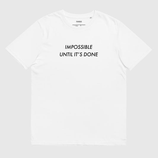 Men's white organic cotton t-shirt that features, "Impossible Until It's Done," inspired by Nelson Mandela's inspirational quote, "It always seems impossible until it's done."