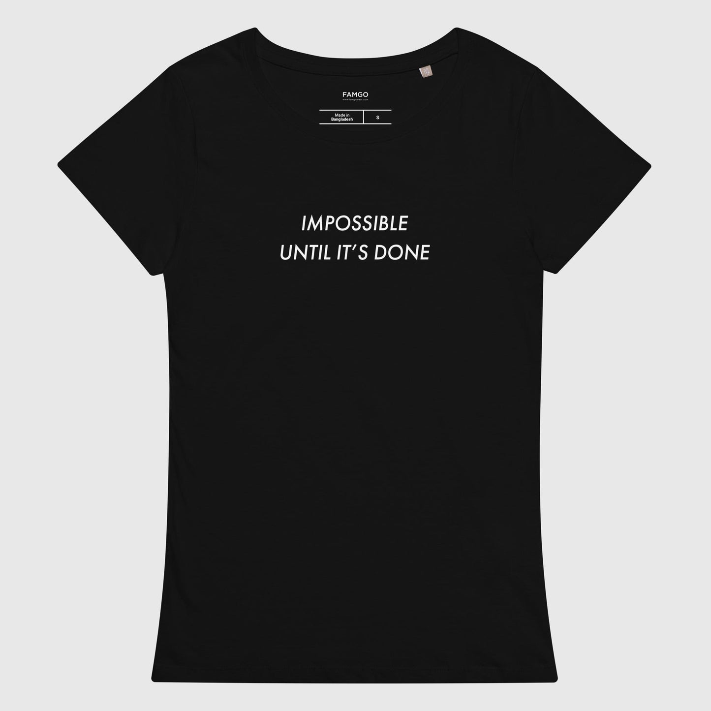Women's black organic cotton t-shirt that features, "Impossible Until It's Done," inspired by Nelson Mandela's inspirational quote, "It always seems impossible until it's done."