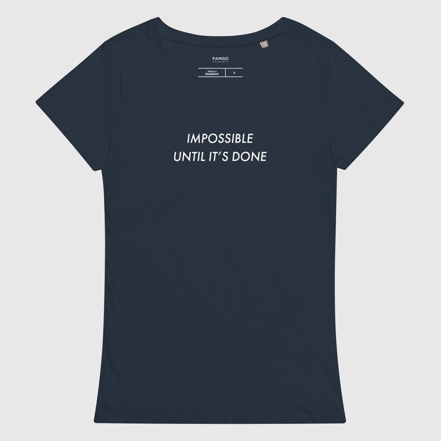Women's french navy organic cotton t-shirt that features, "Impossible Until It's Done," inspired by Nelson Mandela's inspirational quote, "It always seems impossible until it's done."
