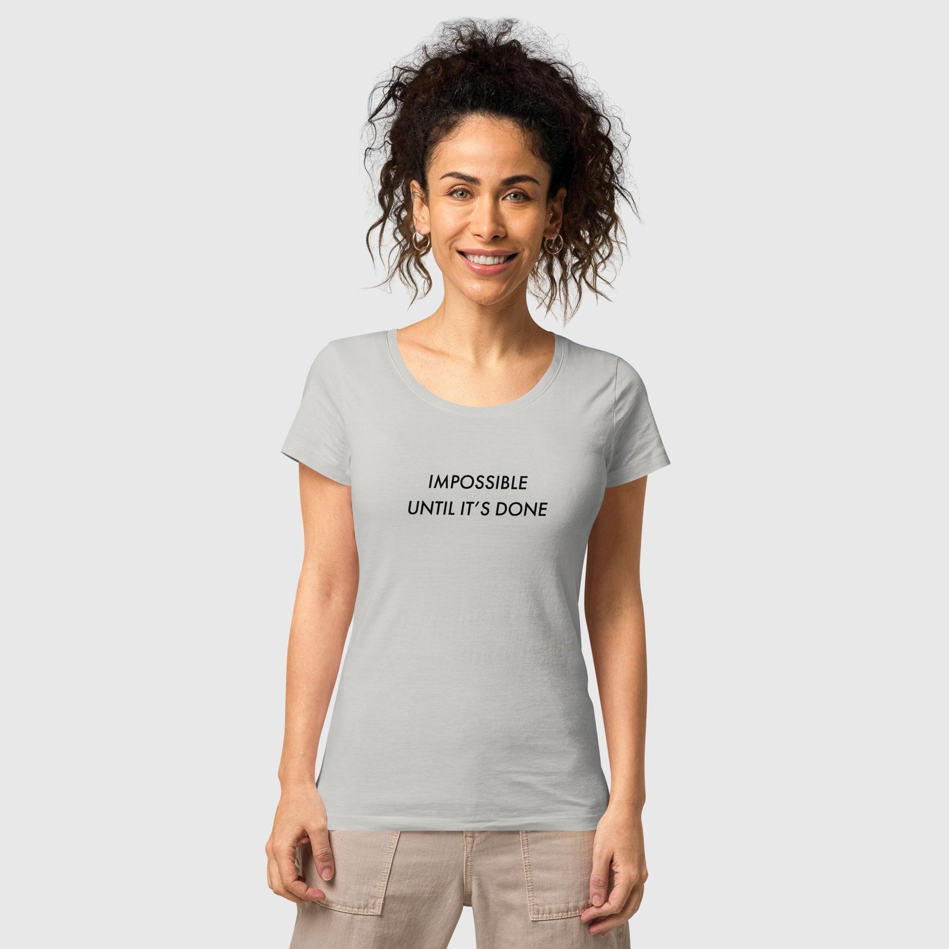 Women's gray organic cotton t-shirt that features, "Impossible Until It's Done," inspired by Nelson Mandela's inspirational quote, "It always seems impossible until it's done."