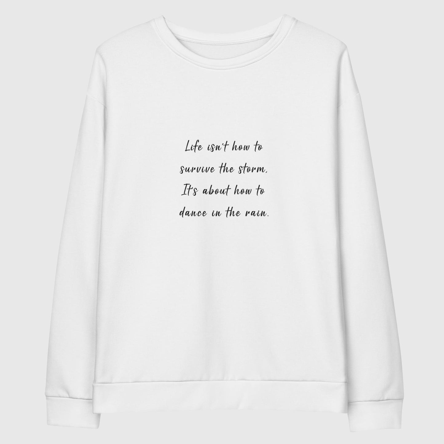 Recycled sweatshirt that features Taylor Swift's quote, "Life isn't how to survive the storm, it's about how to dance in the rain."