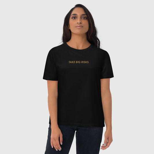 Women's black oversized organic cotton t-shirt that features Bill Gates' quote on success, "Take Big Risks." 