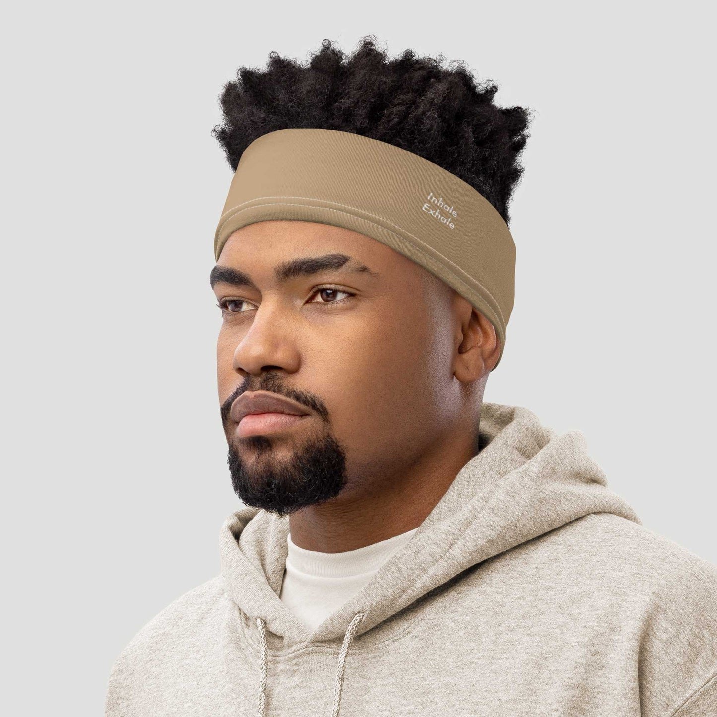 Man wearing an Inhale Exhale inspirational quote headband