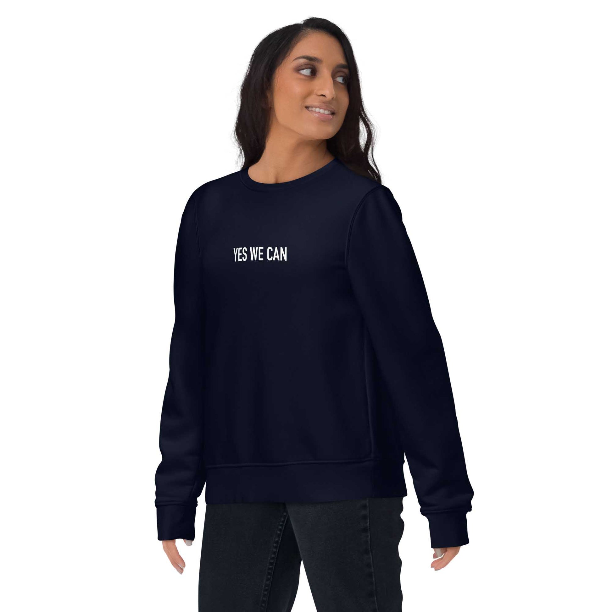 Women navy sustainable sweatshirt with Barack Obama's inspirational quote, "Yes We Can." 